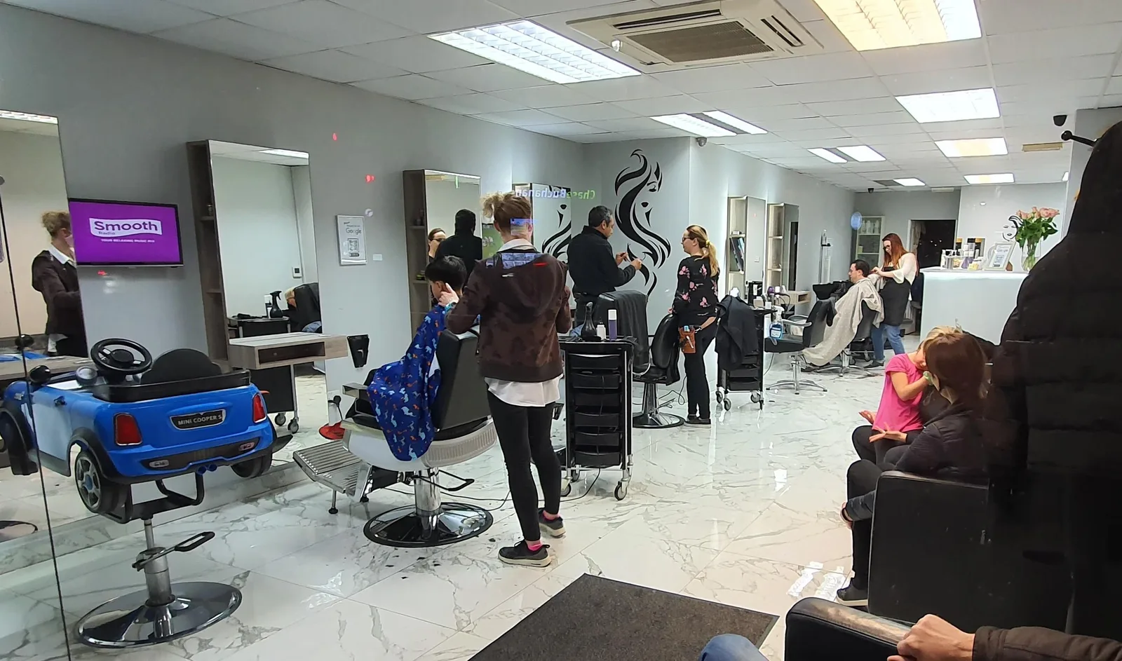 Hair salon interior during an appointment