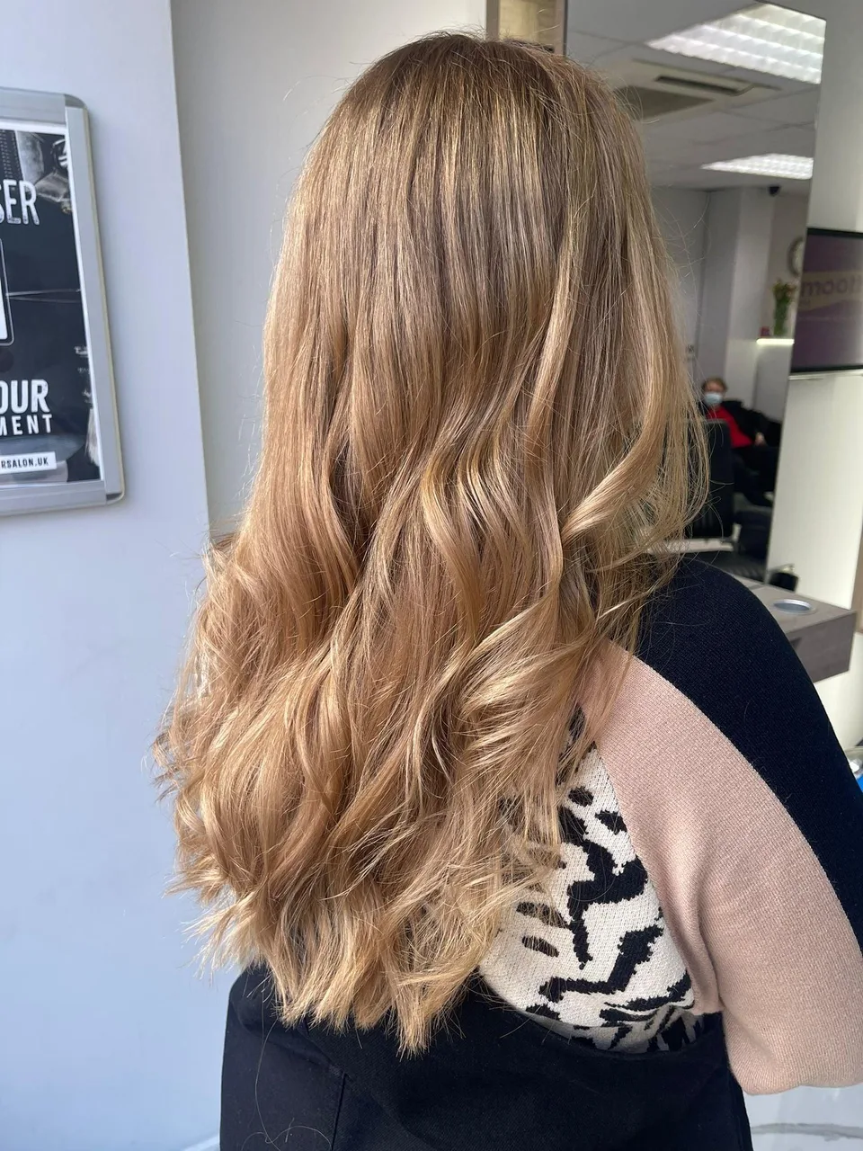 Long blonde styled hair